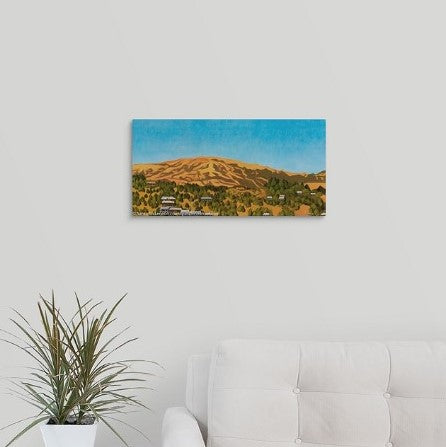 A painting of the summertime, golden hills of the town of Kentfield, California, featuring scattered homes nestled between rows of trees, under a clear blue Northern California sky over a white couch