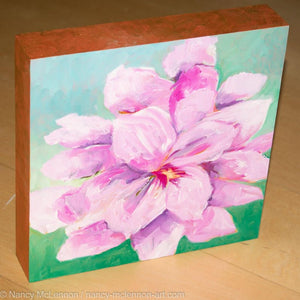 A painting, by fine artist Nancy McLennon, of a single Lavender Amaryllis on mint sideview