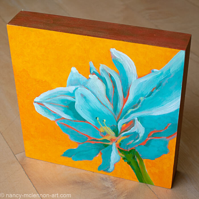 a painting by fine artist Nancy McLennon of a teal amaryllis on a yellow background sideview