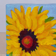 a painting by fine artist Nancy McLennon of a yellow sunflower with brown center on a blue ombre background detail