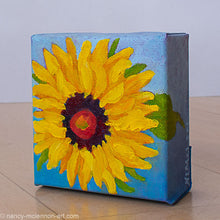 Load image into Gallery viewer, a painting by fine artist Nancy McLennon of a yellow sunflower with brown center on a blue ombre background side view