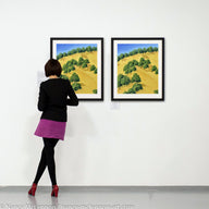 Two Paintings of sunlit trees on the golden hillside that surrounding Lake Berryessa in the Napa Valley, California in summertime hanging on a gallery wall with art patron