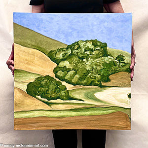 A diptych landscape painting of golden and straw-colored hillside in Marin County, with rows of trees under a blue sky held by artist