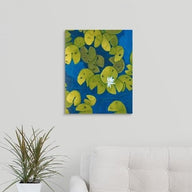 A painting, by fine artist Nancy McLennon, of a deep blue & aqua blue pond with floating golden yellow lily pads and white flower blooms hanging over a couch