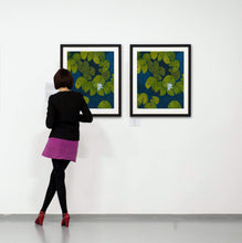 Load image into Gallery viewer, A deep blue &amp; aqua blue pond with floating golden yellow lily pads and white flower blooms painting on a gallery wall with a patron viewer