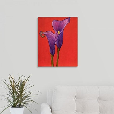 A painting by fine artist Nancy McLennon, by two deep purple calla lilies on red background, hanging over a white couch